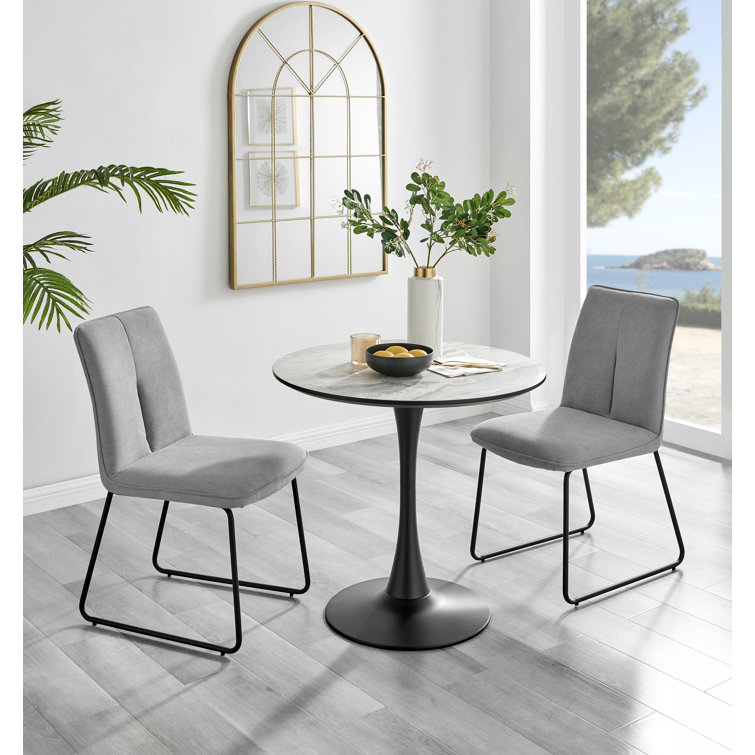 Round table store grey chairs